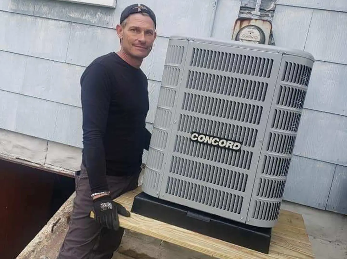Tom from Hunter Heating and Cooling at work on an installation